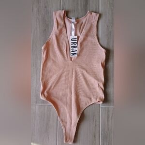 NWT Urban Outfitters Highleg Bodysuit Size L color Tan